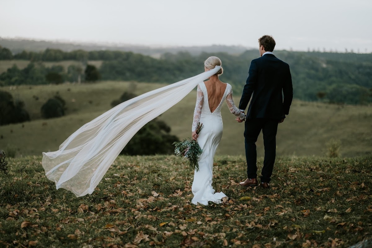 Aerial view of Byron Bay hinterland wedding venue surrounded by lush green hills