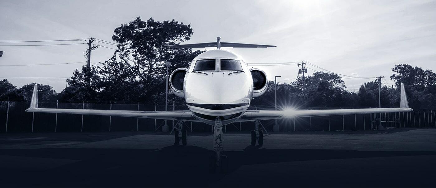 Luxury private charter jet parked at general aviation terminal